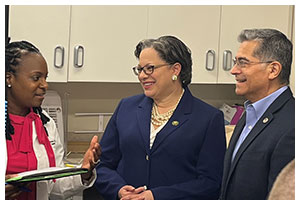 Shantelle Brown, owner of Hope Pharmacy (at left) in Richmond, Va., hosted Virginia Rep. Jennifer McClellan (center) and HHS Secretary Xavier Becerra (right)